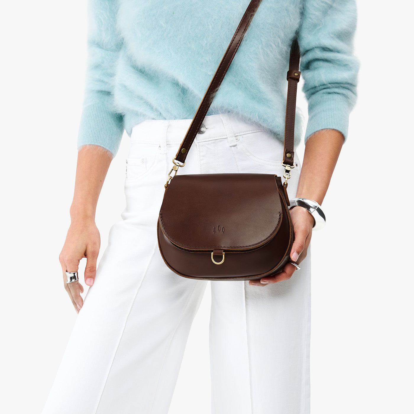 Chocolate Brown*Small | Model wearing a petite leather Crossbody with a flap and magnetic closure