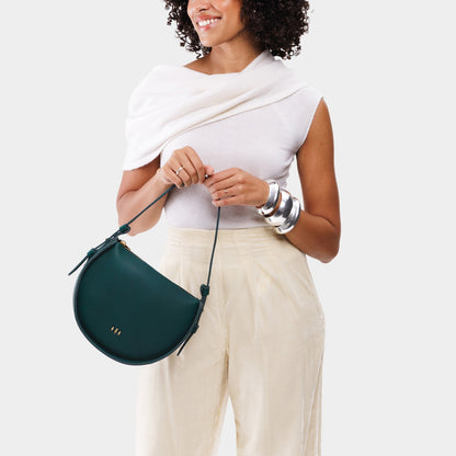 Harbor | Model wearing a rounded structured shoulder bag