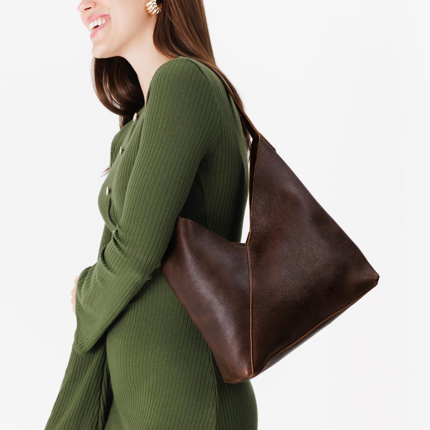 Coldbrew*Large | Model wearing mid-size shoulder bag with magnetic snap closure