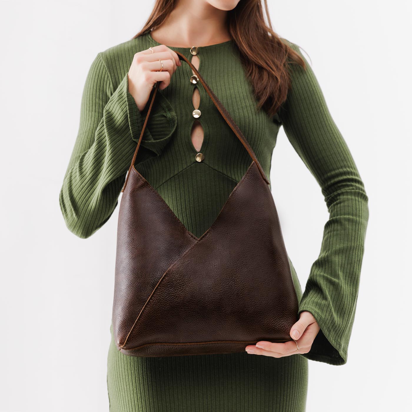 Coldbrew*Large | Model wearing mid-size shoulder bag with magnetic snap closure