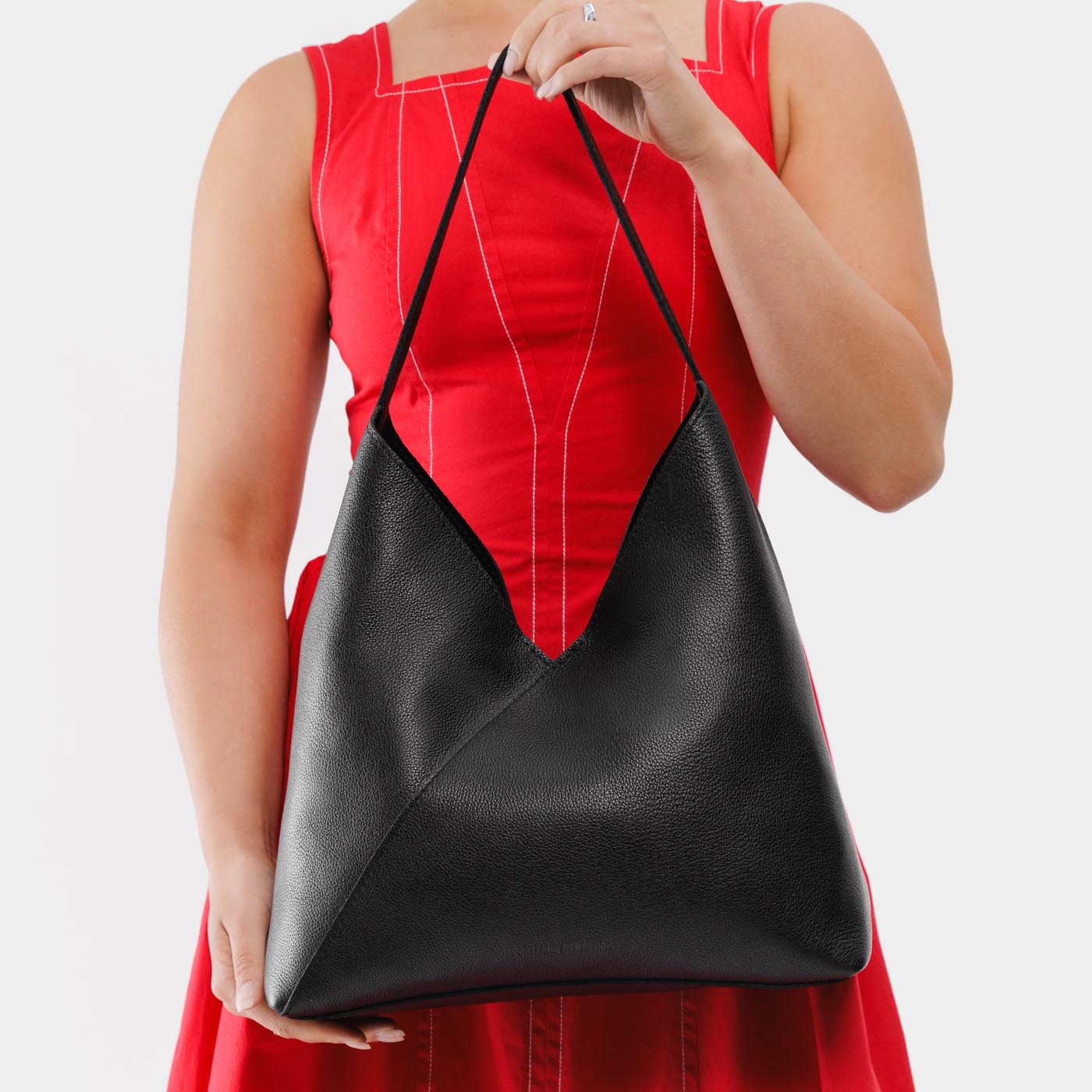 Pebbled--black*Oversized | Model wearing large shoulder bag with magnetic snap closure