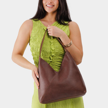 Durango*Oversized | Model wearing large shoulder bag with magnetic snap closure