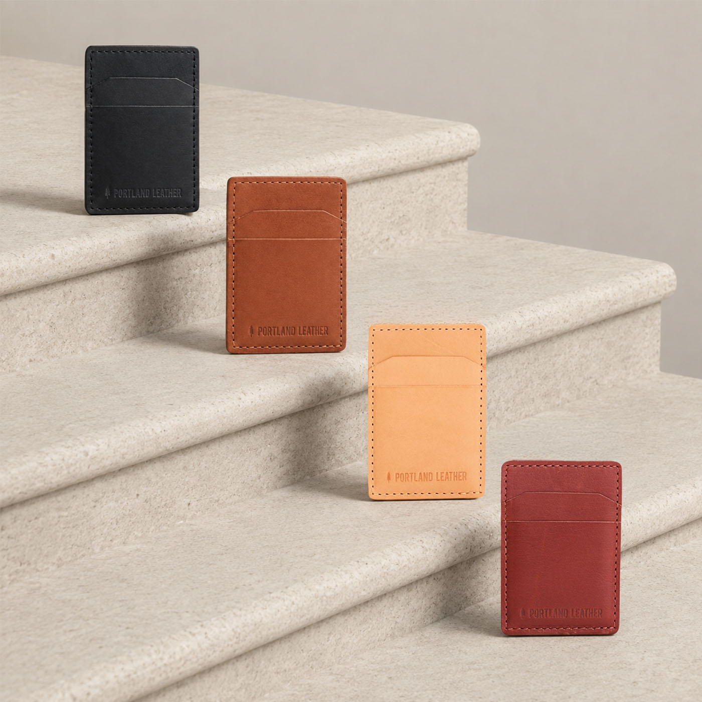 Nero | Four card holders standing upright on steps