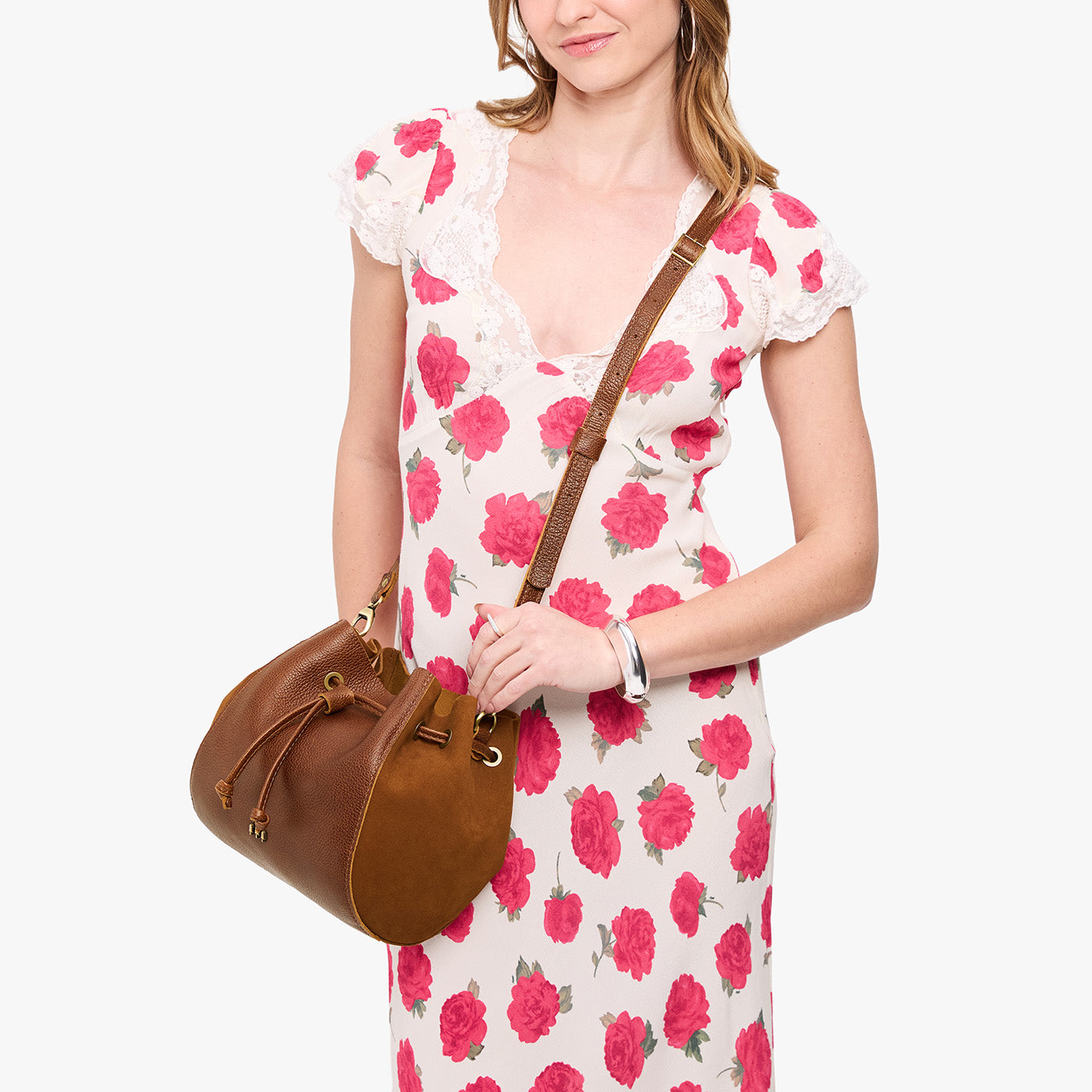 Asheville | Model wearing bucket bag with cinched drawstring closure