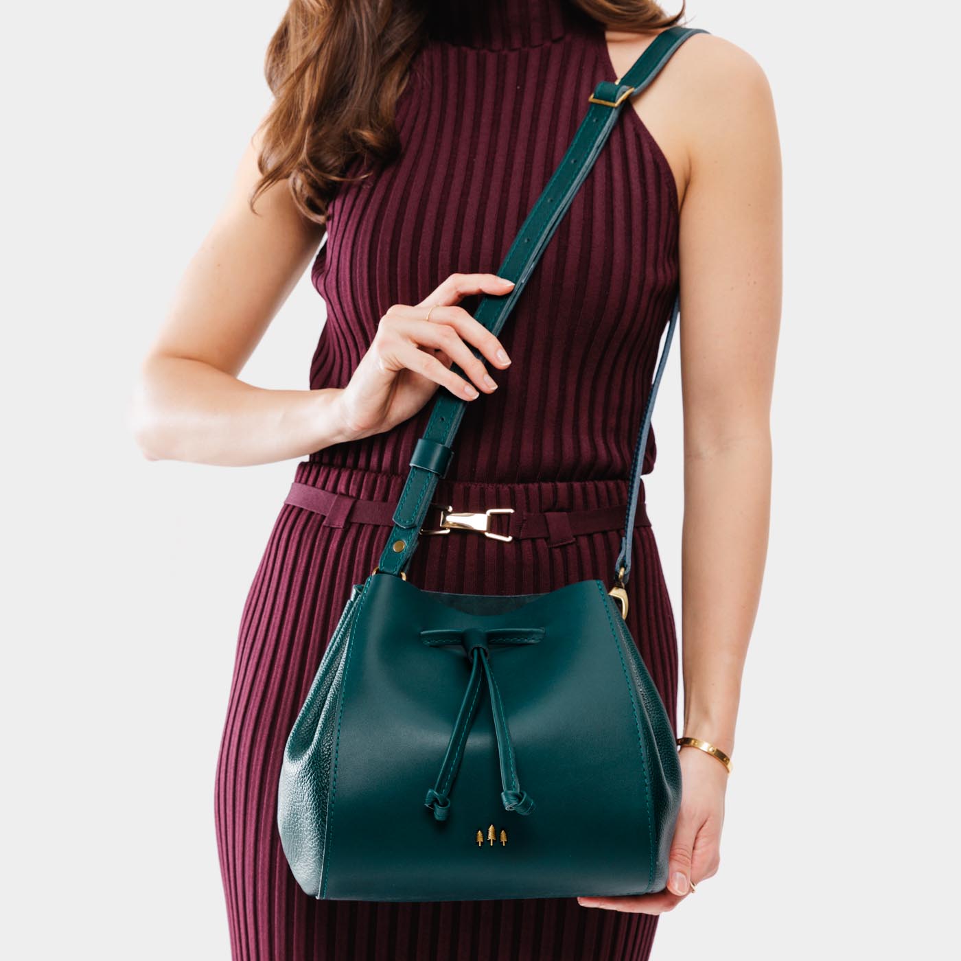 Harbor | Model wearing bucket bag with cinched drawstring closure