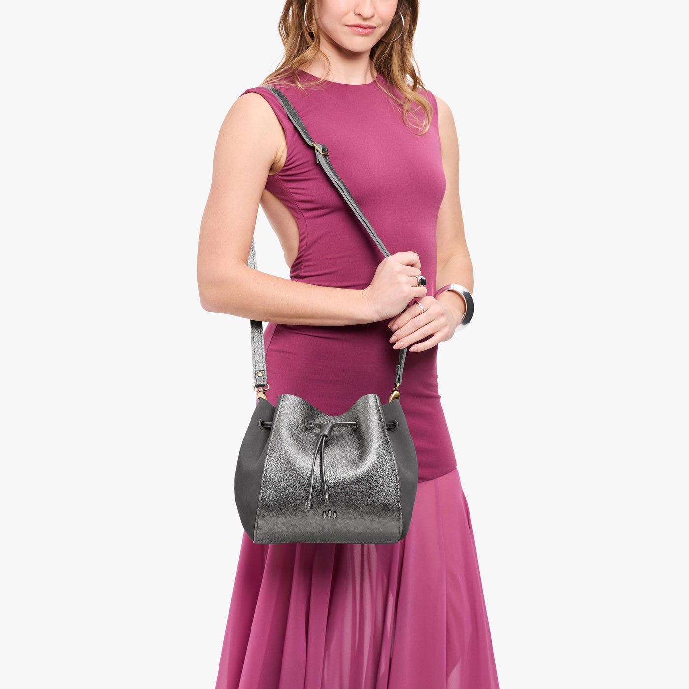 Stardust | Model wearing bucket bag with cinched drawstring closure