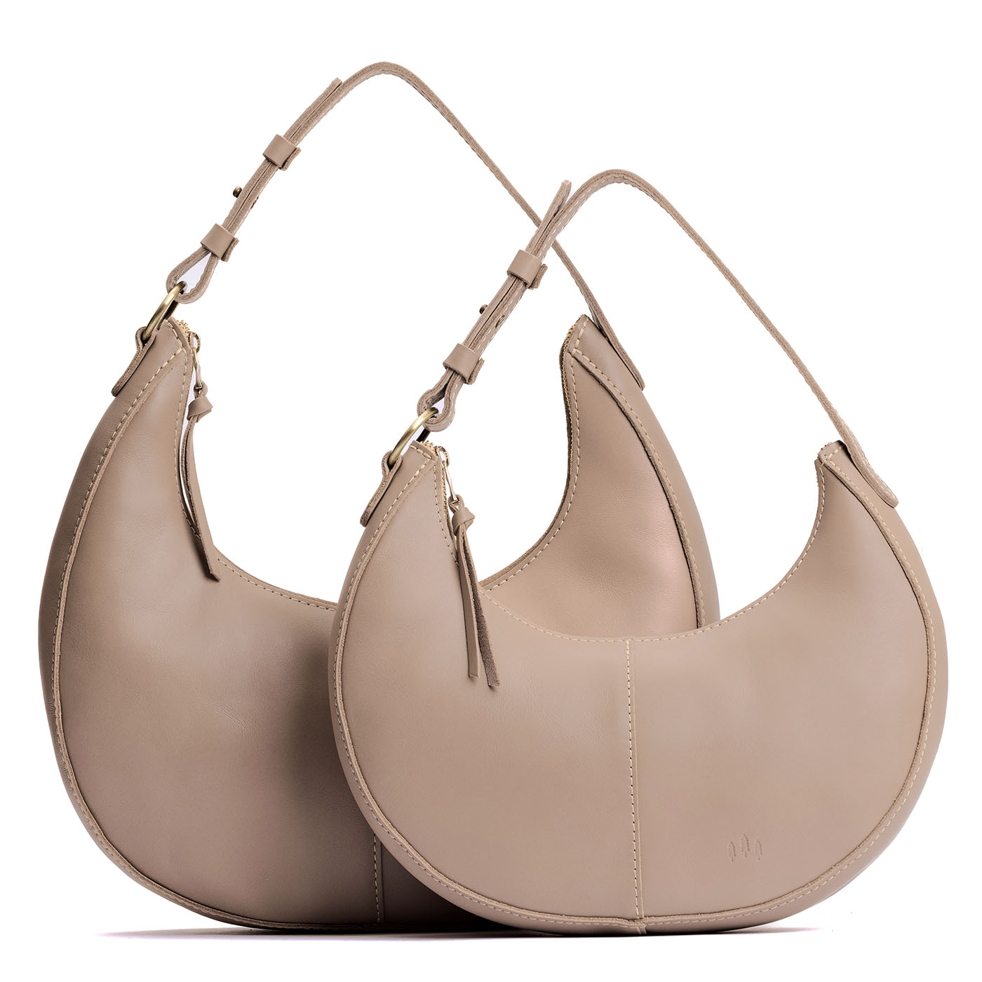 Stone | Crescent shaped shoulder bag with zipper closure and adjustable strap