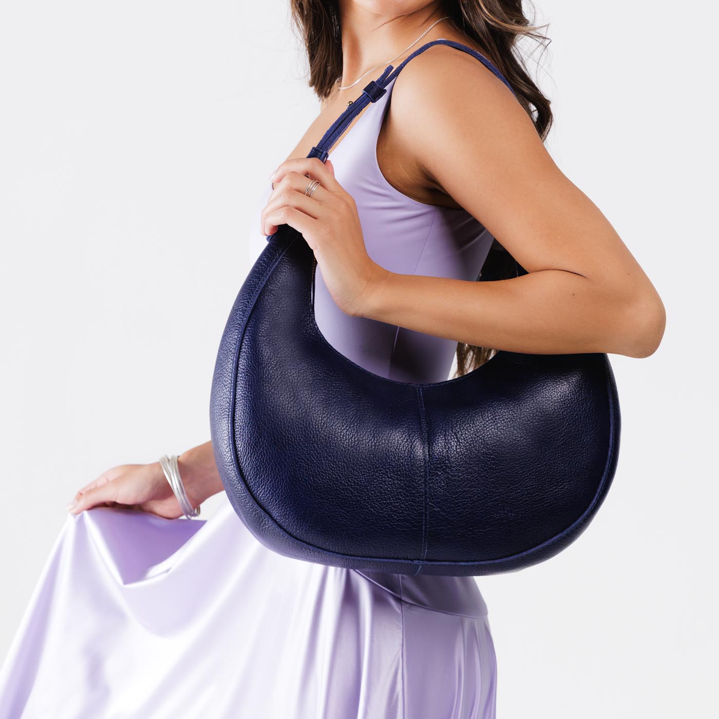 Cobalt*Large | Crescent shaped shoulder bag with zipper closure and adjustable strap
