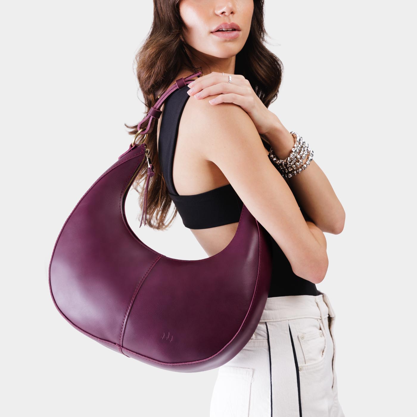 Lollipop*Large | Crescent shaped shoulder bag with zipper closure and adjustable strap