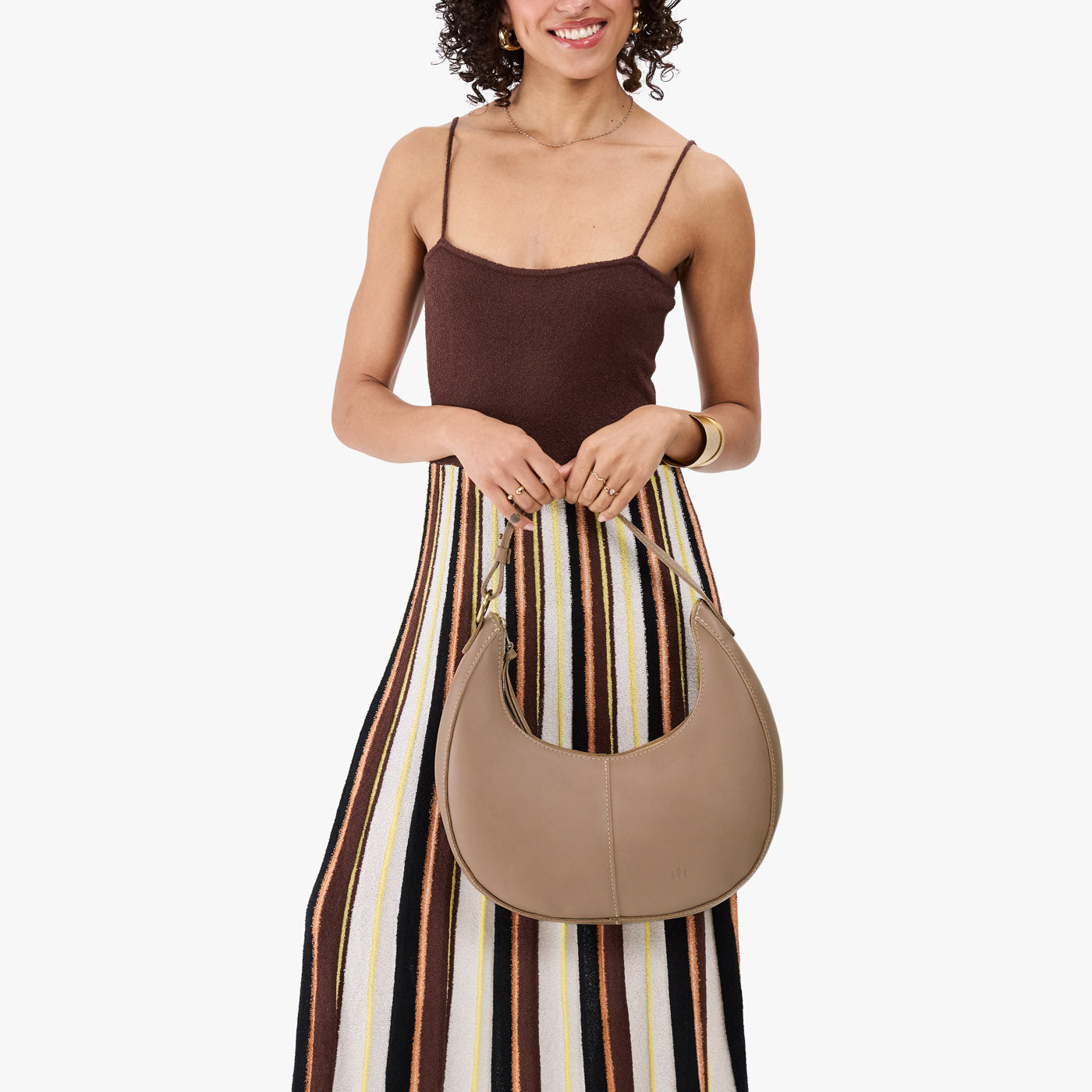 Stone*Large | Crescent shaped shoulder bag with zipper closure and adjustable strap