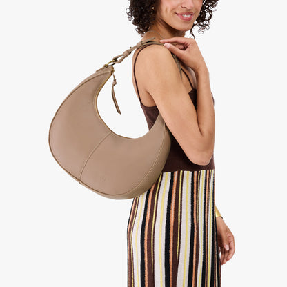 Stone*Large | Crescent shaped shoulder bag with zipper closure and adjustable strap