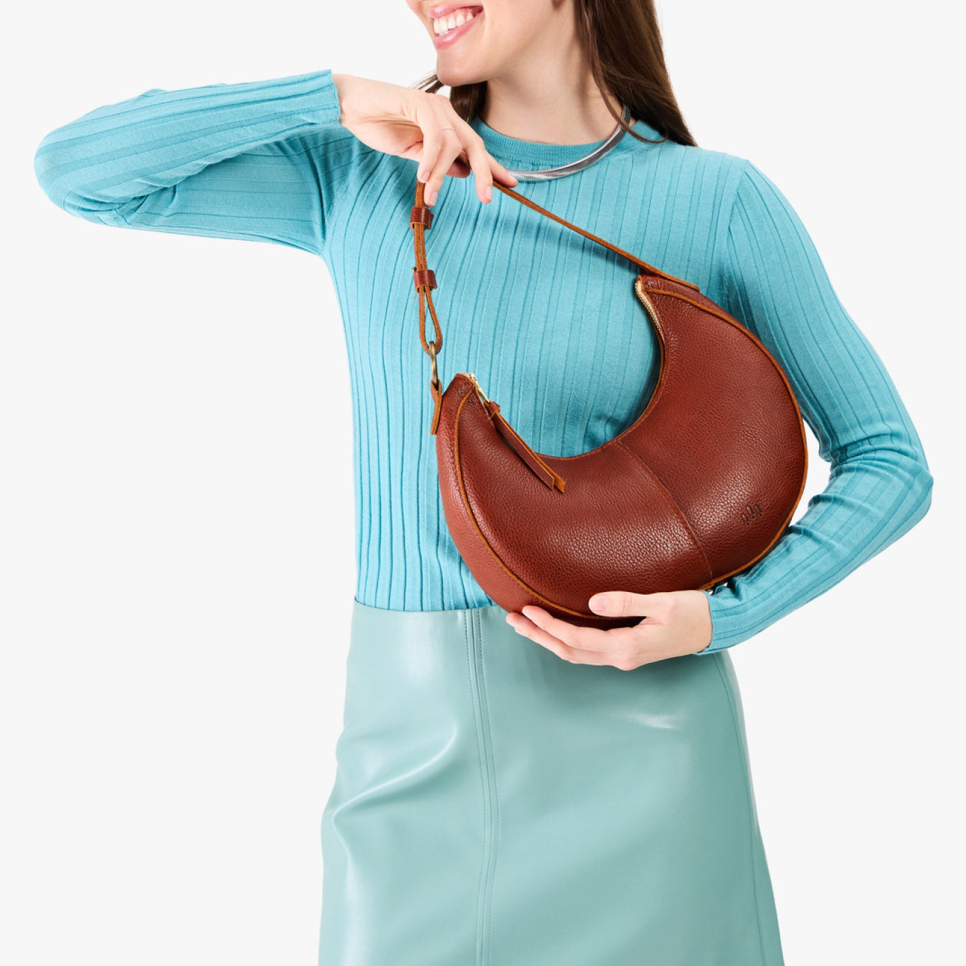 Nutmeg*Small | Crescent shaped shoulder bag with zipper closure and adjustable strap