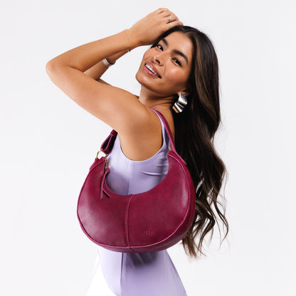 Orchid*Small | Crescent shaped shoulder bag with zipper closure and adjustable strap