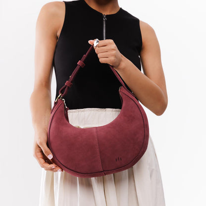 Red Panda*Small | Crescent shaped shoulder bag with zipper closure and adjustable strap