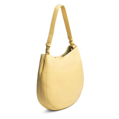 Butter Bliss*Large | Rounded shoulder bag with adjustable strap on a white background