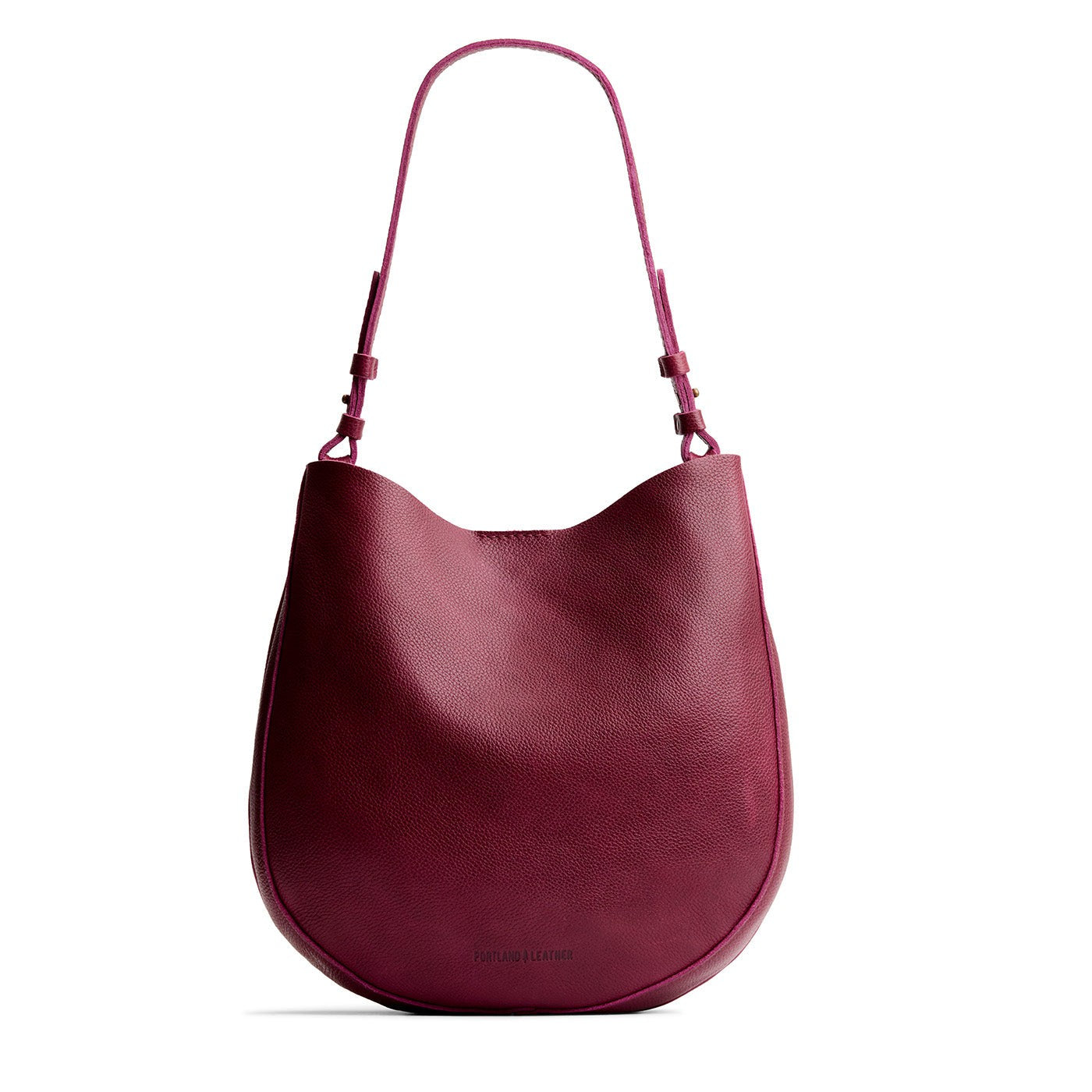 Orchid*Large | Rounded shoulder bag with adjustable strap on a white background