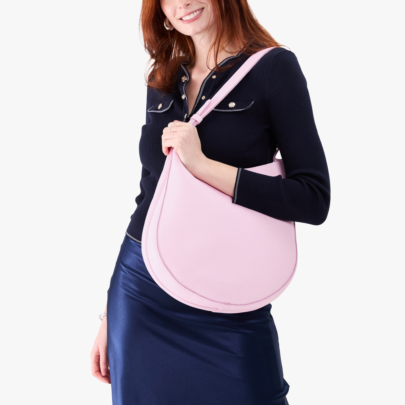 Pinkaboo*Large | Model holding round leather purse with adjustable shoulder strap