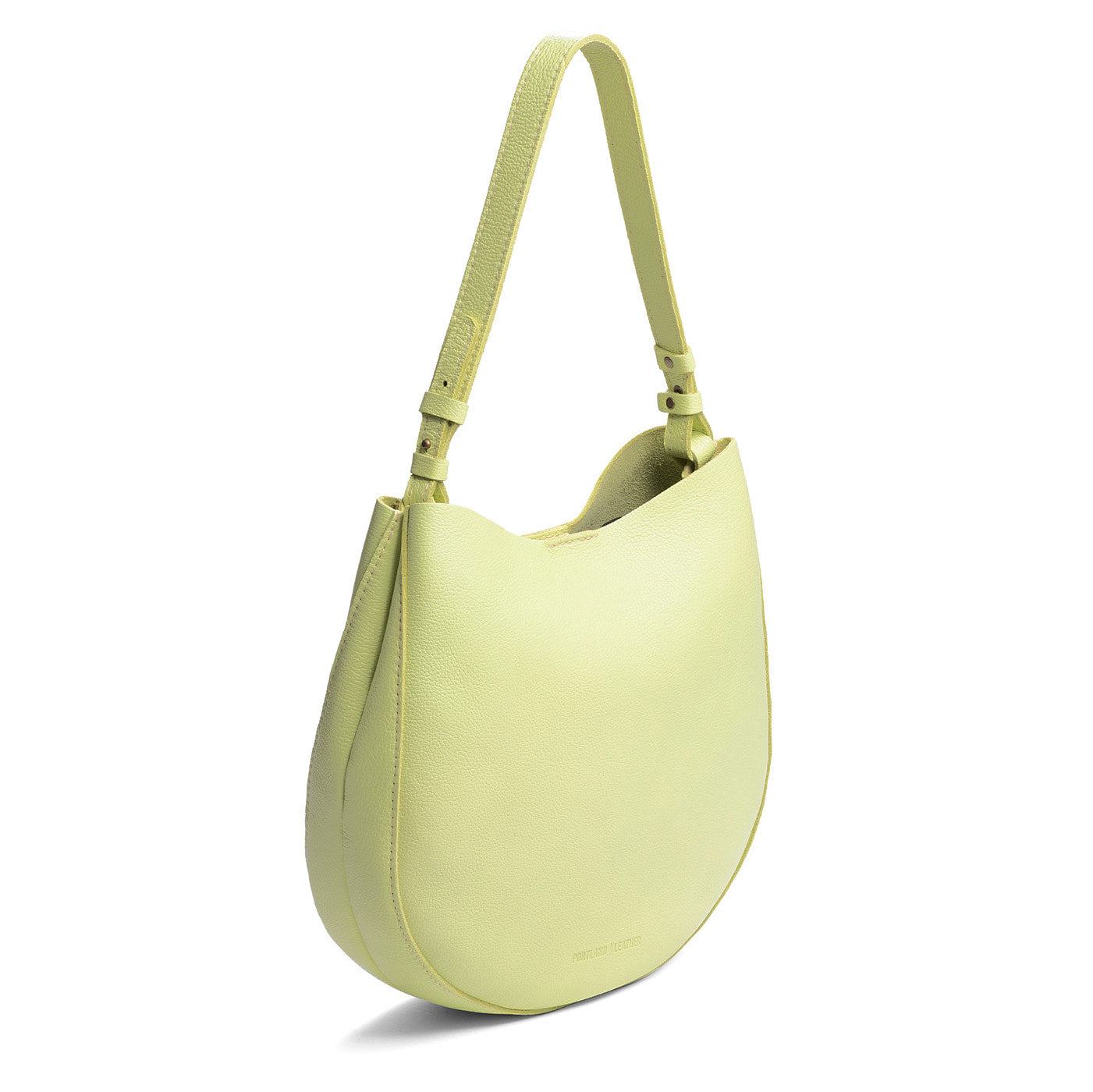 Shadow Lime*Large | Rounded shoulder bag with adjustable strap on a white background