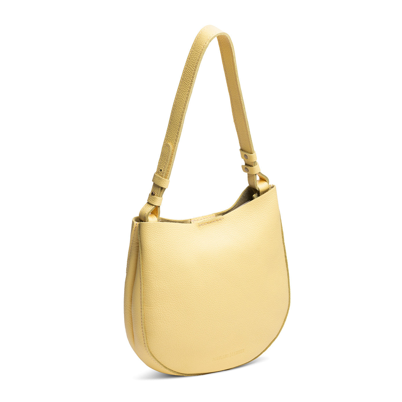 Butter Bliss*Medium | Rounded shoulder bag with adjustable strap on a white background