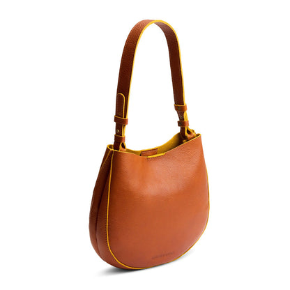 Sienna*Medium | Rounded shoulder bag with adjustable strap on a white background