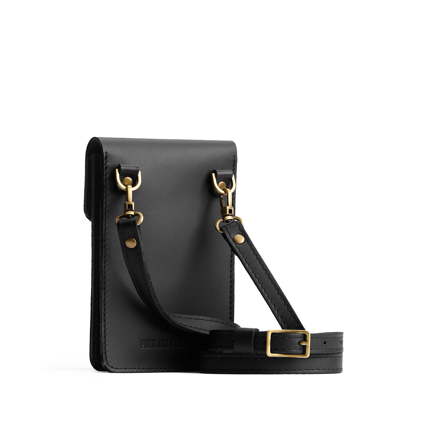 Black | Slim, phone-shaped crossbody purse with magnetic closure