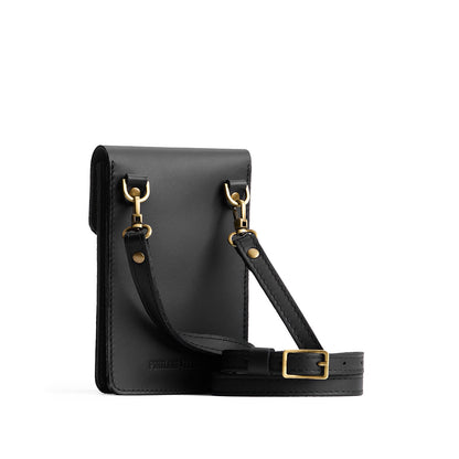 Black | Slim, phone-shaped crossbody purse with magnetic closure