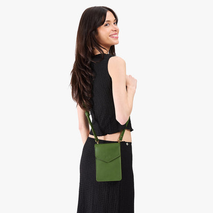 Cactus | Model wearing slim, phone-shaped crossbody purse with magnetic closure