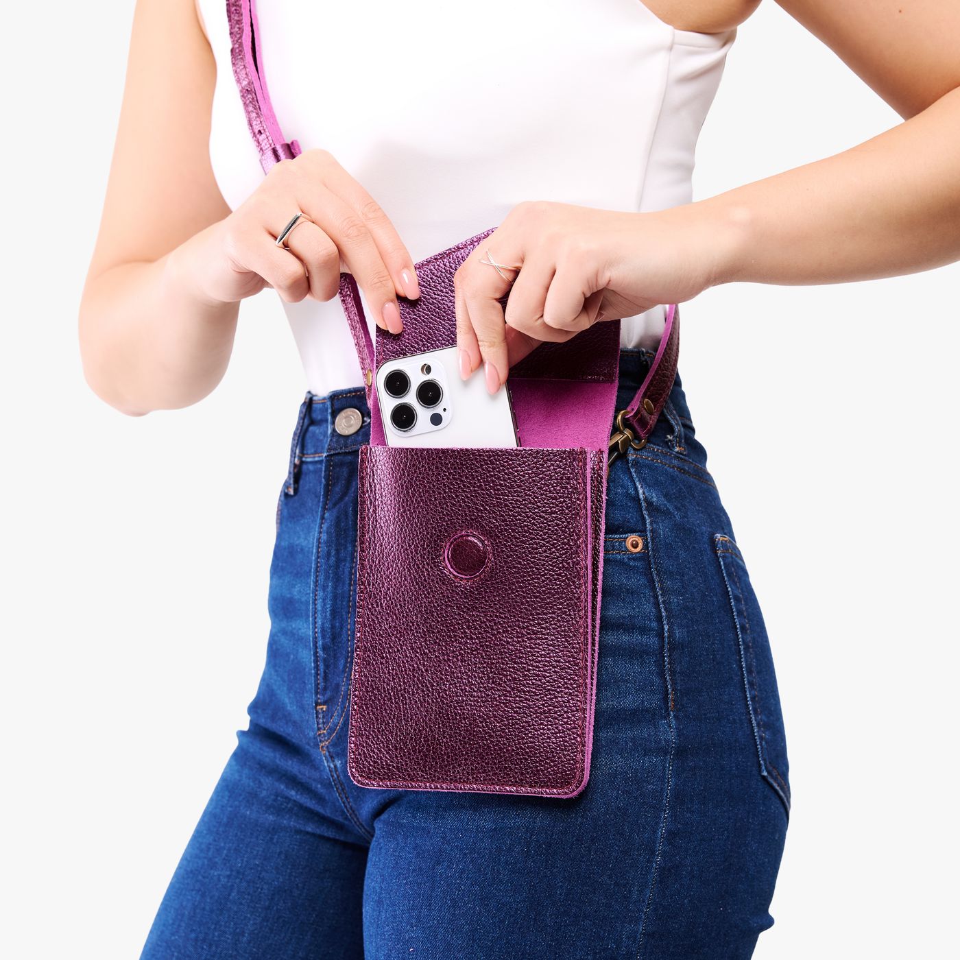 Ultra Violet | Model wearing slim, phone-shaped crossbody purse with magnetic closure