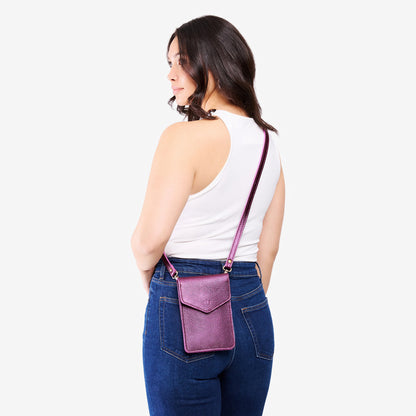 Ultra Violet | Model wearing slim, phone-shaped crossbody purse with magnetic closure