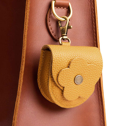 Sunshine | U shaped pouch with leather flower applique