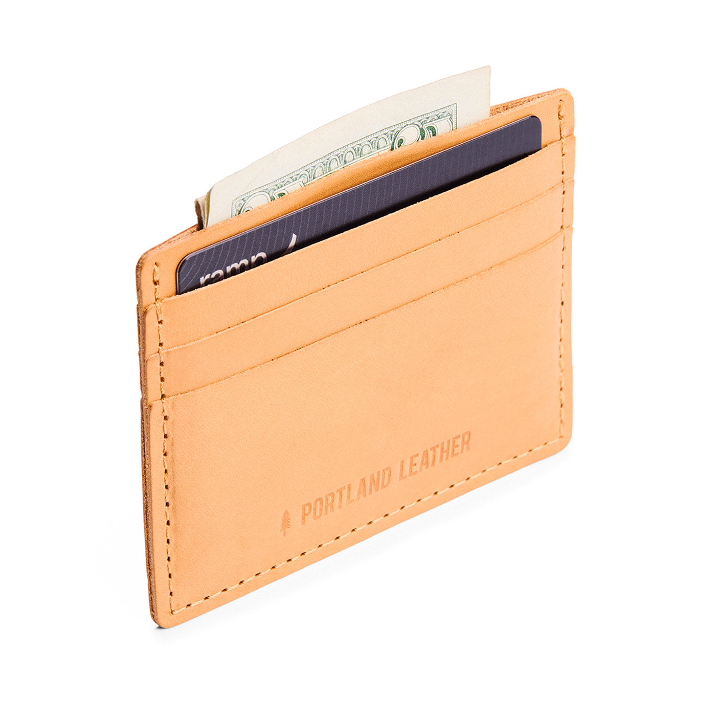 Slim wallet with three card slots and a top slot