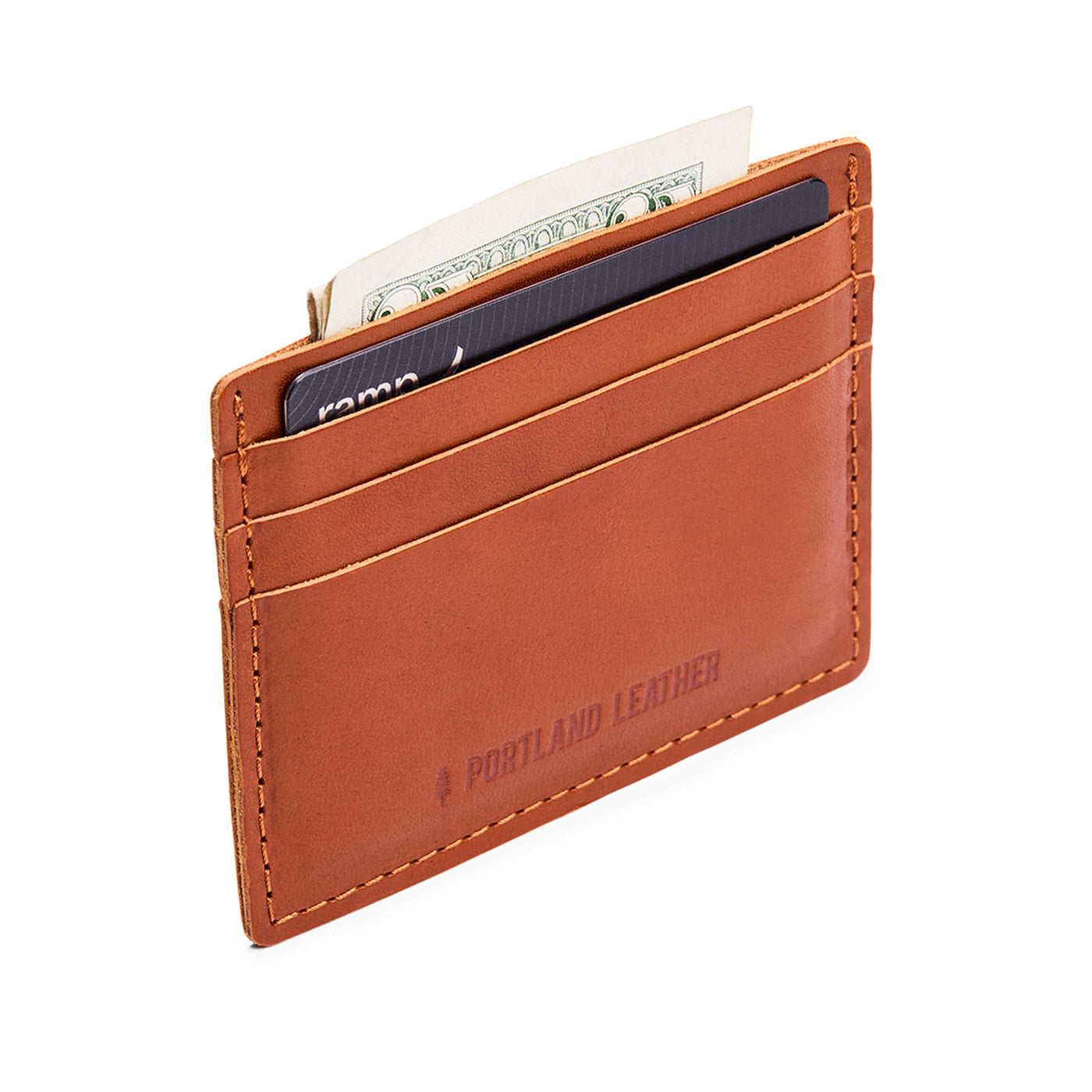 Slim wallet with three card slots and a top slot