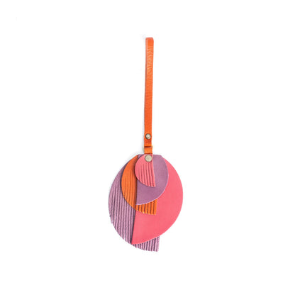 Merry Berry | Intricately cut leather shapes and fringe