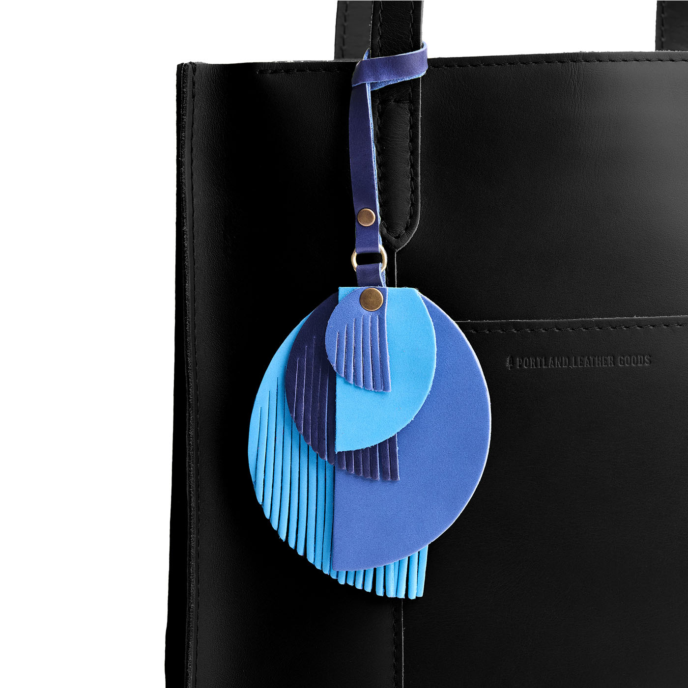Ocean | Intricately cut leather shapes and fringe