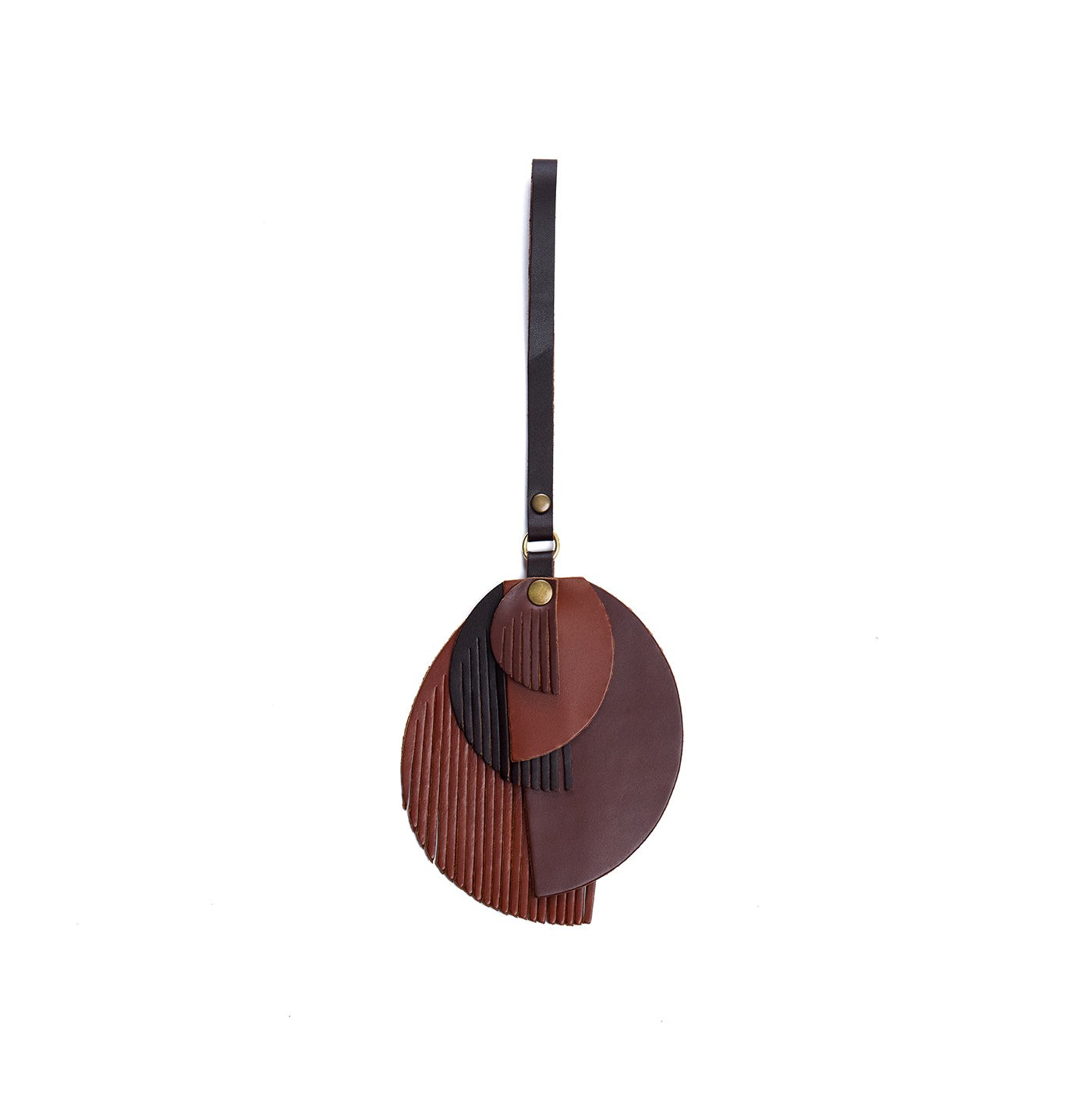 Portrait | Intricately cut leather shapes and fringe