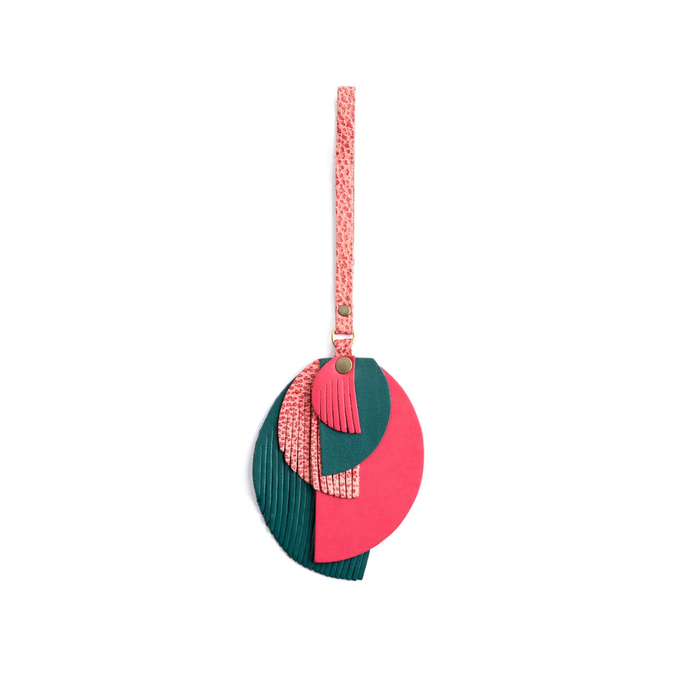 Quetzal | Intricately cut leather shapes and fringe