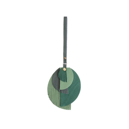 Rain Forest | Intricately cut leather shapes and fringe