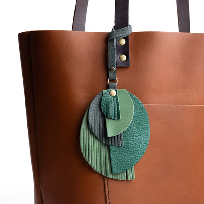 Rain Forest | Intricately cut leather shapes and fringe