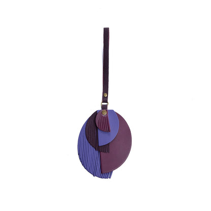 Sphere | Intricately cut leather shapes and fringe