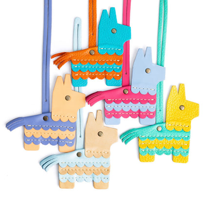 All Variants | Collection shot of leather piñata shaped tassels