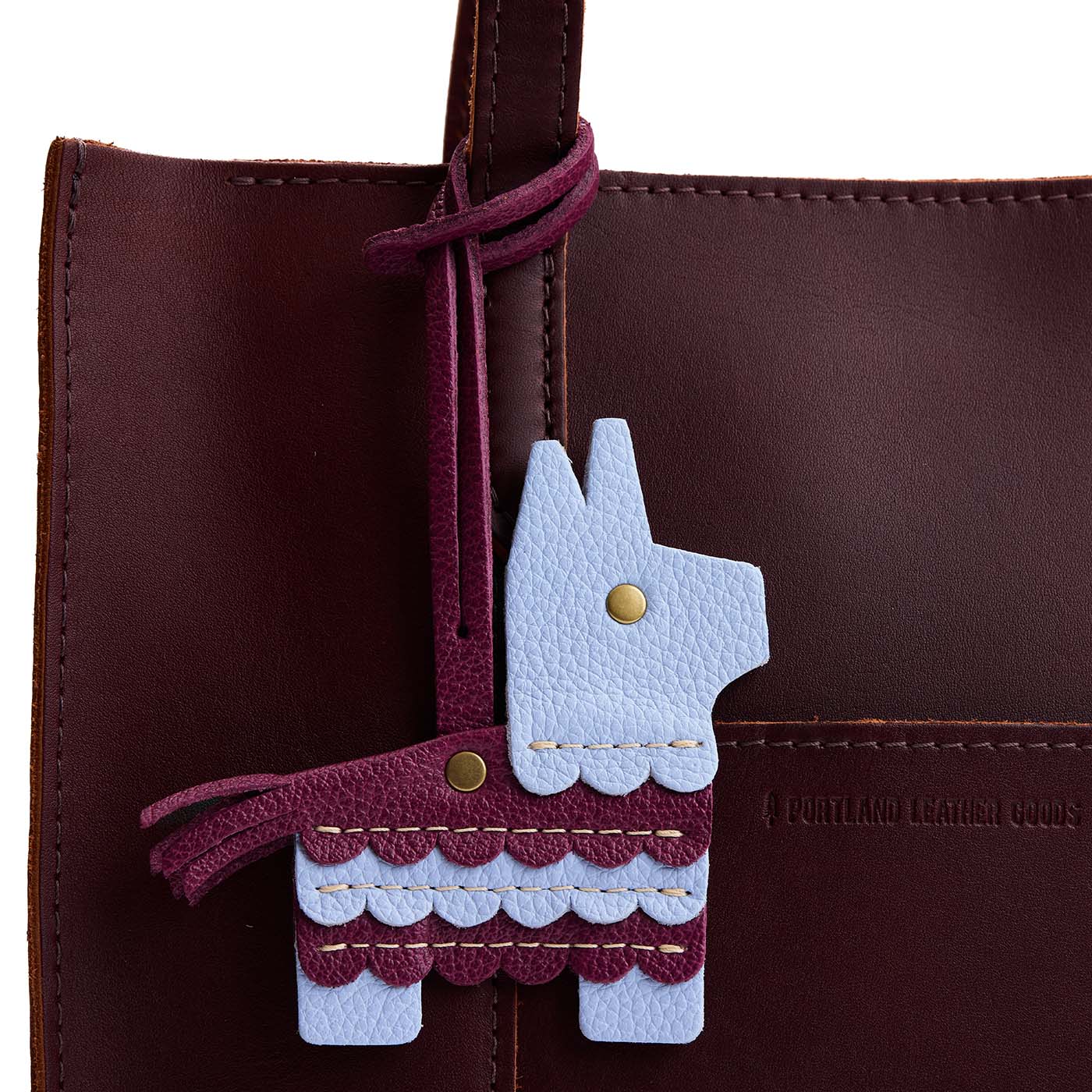 Skyway | Leather piñata shaped tassel