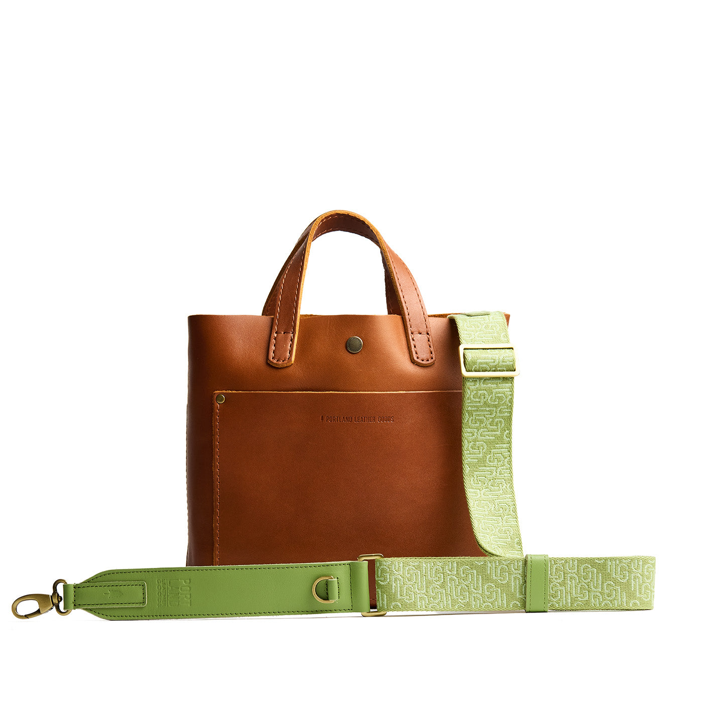 Citrus Rush | Leather and webbing strap with repeating PLG lettering on a leather bag