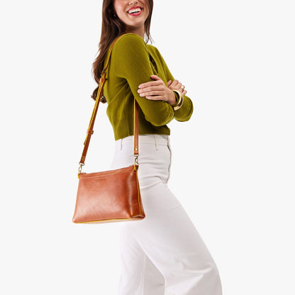 Sienna*Large | Model wearing a zip top crossbody bag with detachable strap