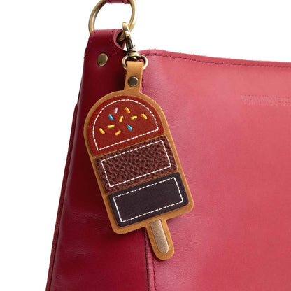 Chestnut | Popsicle keychain with a lobster clasp on a bag