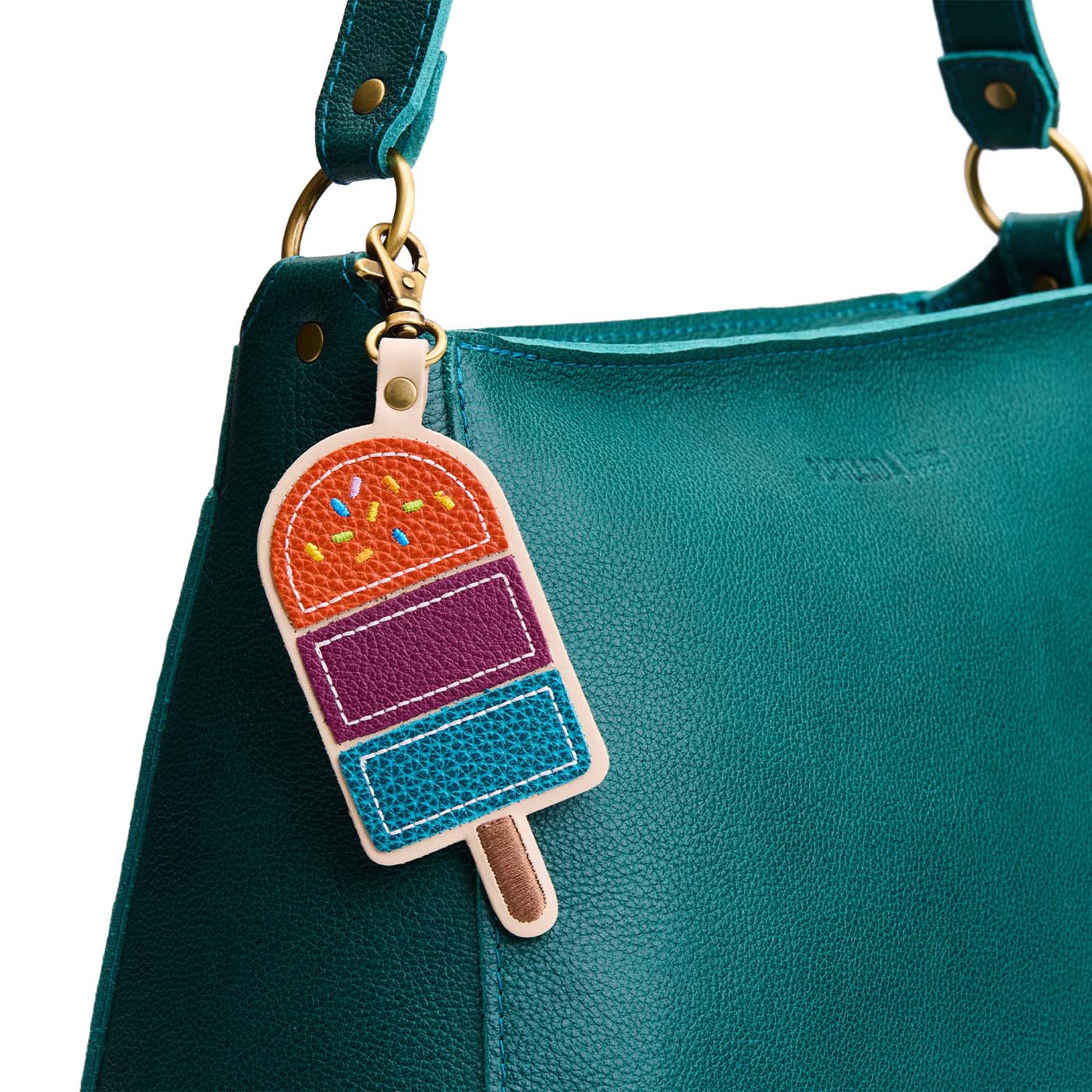 Koi | Popsicle keychain with a lobster clasp on a bag