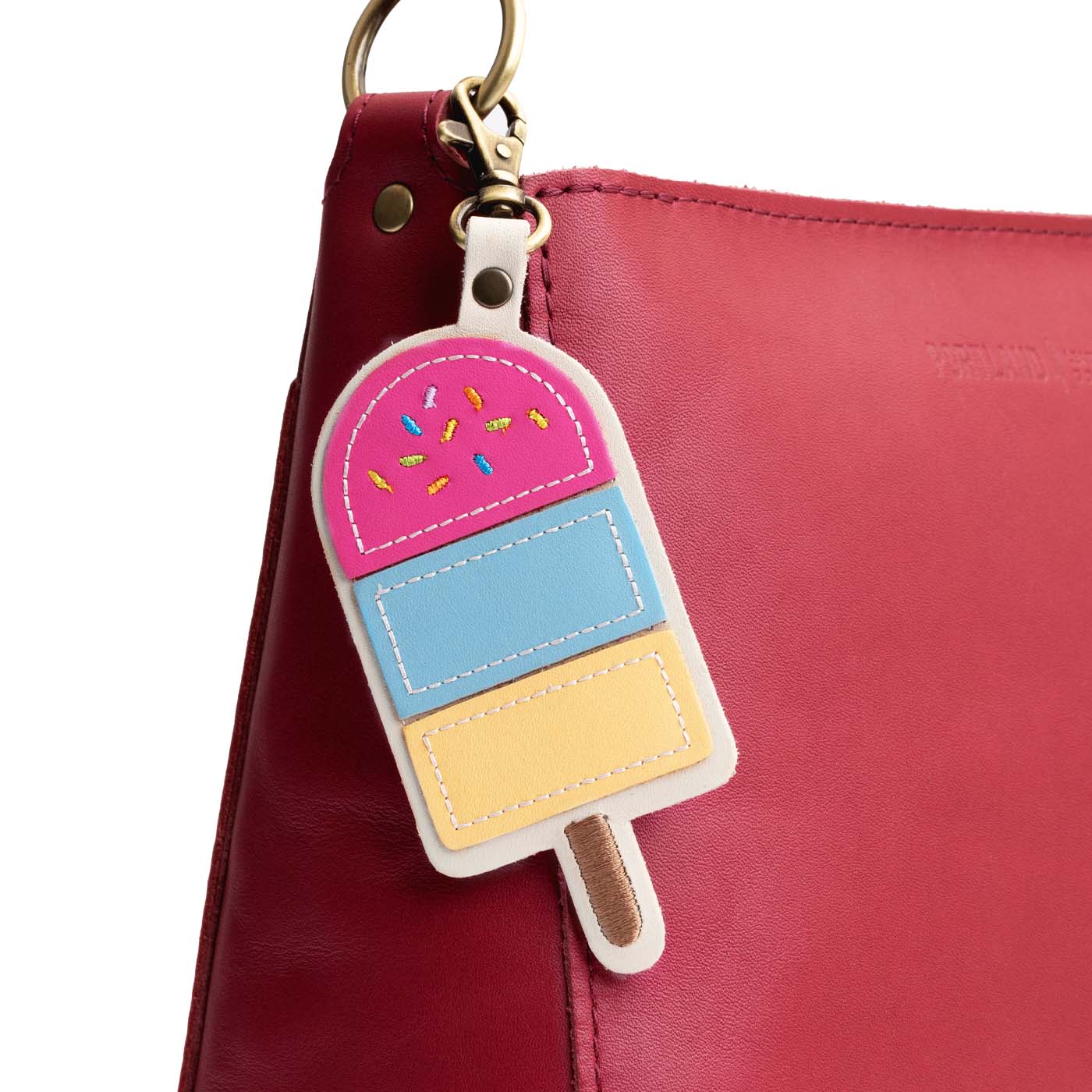 Margot | Popsicle keychain with a lobster clasp on a bag
