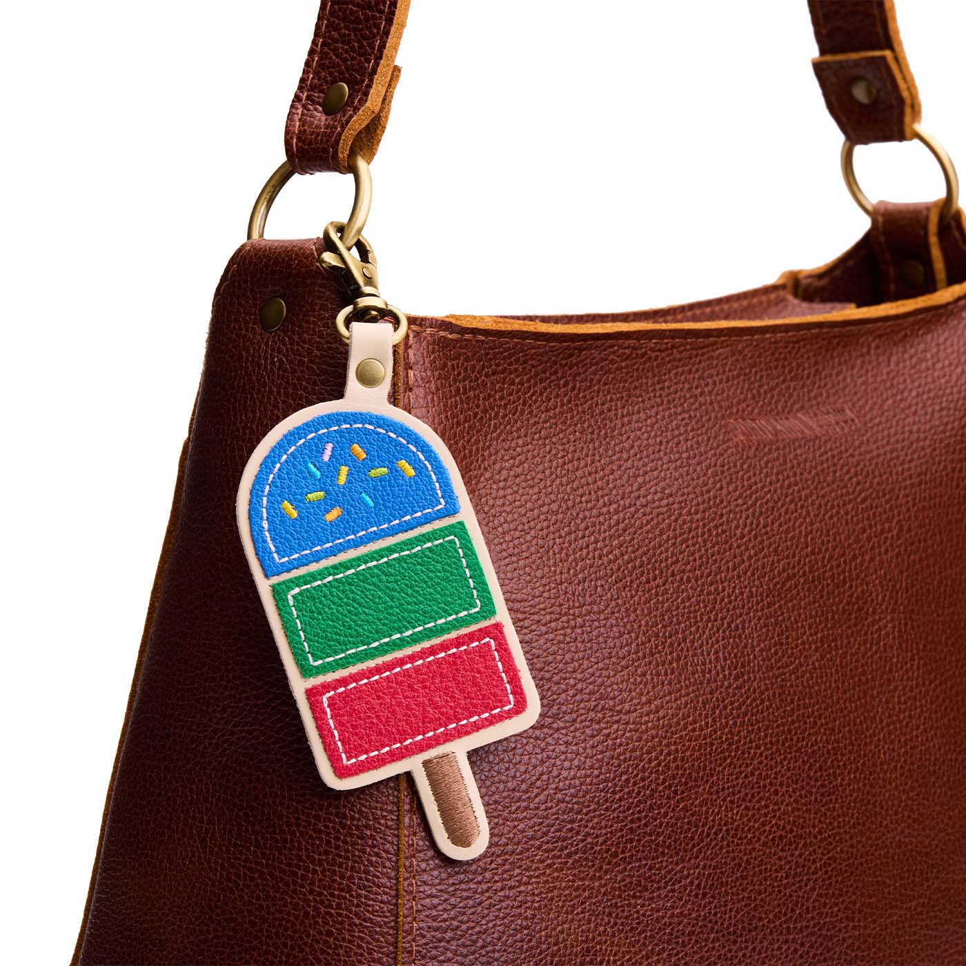 Skydive | Popsicle keychain with a lobster clasp on a bag