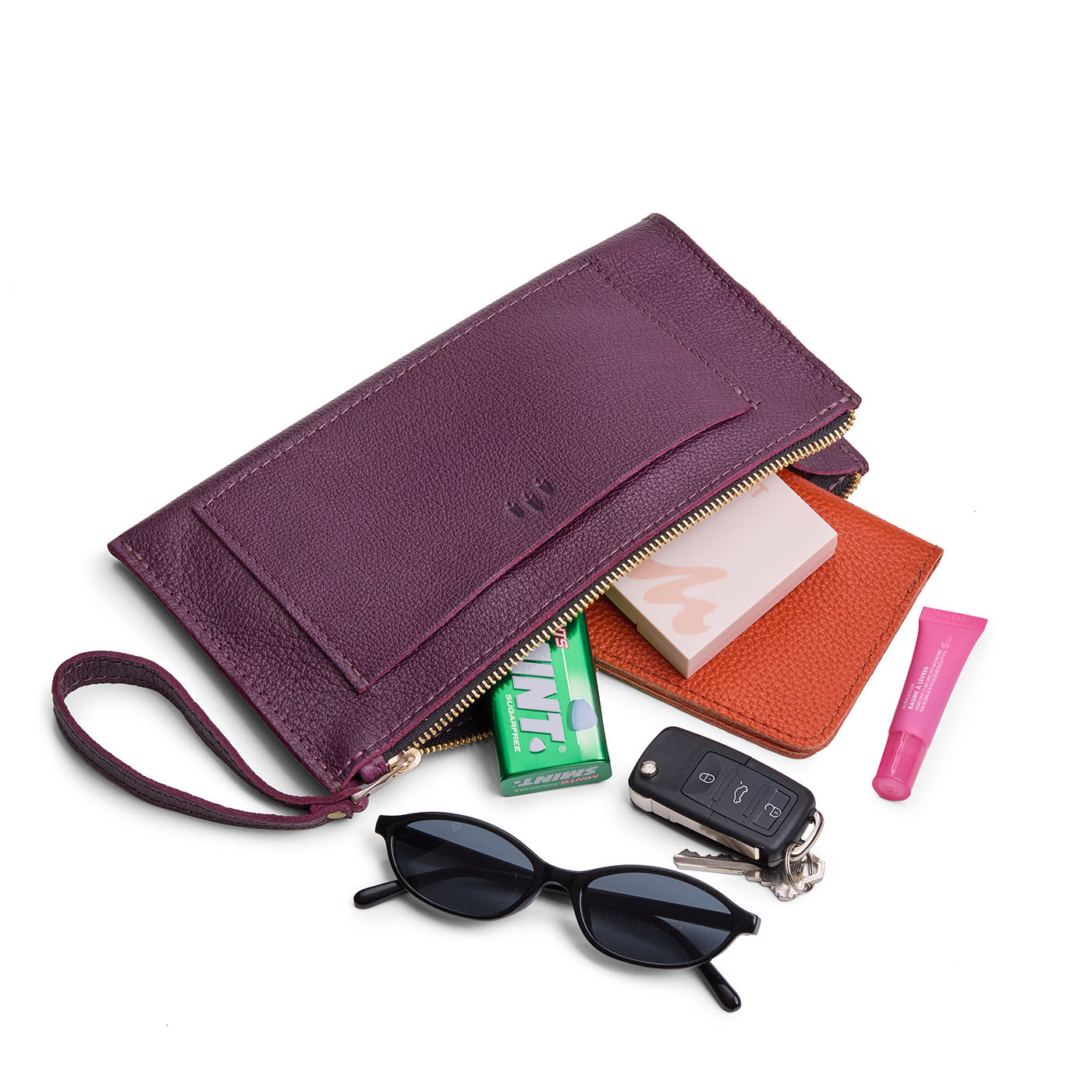 Plum*Large | Wristlet pouch with front pocket and zipper closure