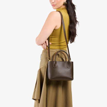 Grizzly*Small | Model wearing petite tote purse with structured leather handles and crossbody strap