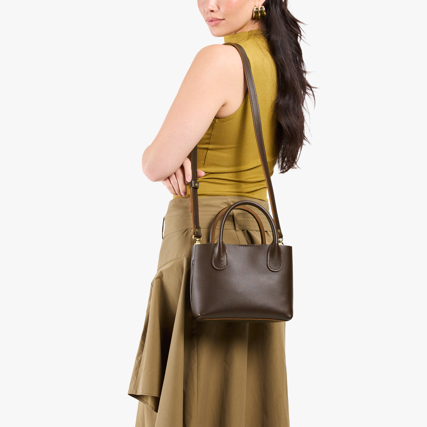 Grizzly*Small | Model wearing petite tote purse with structured leather handles and crossbody strap